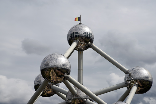 The Atomiumis a landmark modernist building in Brussels, Belgium, originally constructed as the centrepiece of the 1958 Brussels World's Fair (Expo 58). The image shows the Atomium partially, captrured during summer season.
