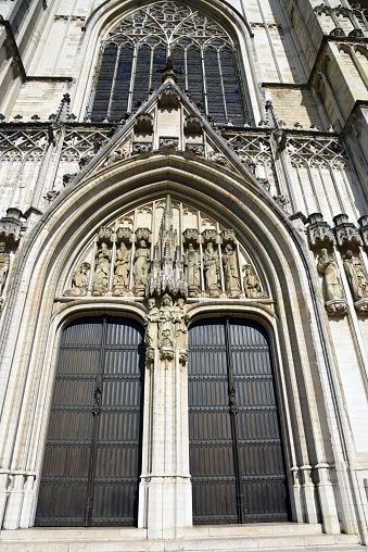 The Cathedral of St. Gudula (Cathedral of St. Michael and St. Gudula) in Brussels. It is a medieval Roman Catholic cathedral in central Brussels, Belgium. The church was built between 11th–15th centuries. The image shows the church main entrance.