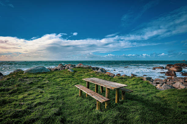istock Table with benches at the seaside in Brittany 2115357976