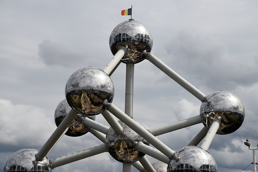 The Atomiumis a landmark modernist building in Brussels, Belgium, originally constructed as the centrepiece of the 1958 Brussels World's Fair (Expo 58). The image shows the Atomium partially, captrured during summer season.