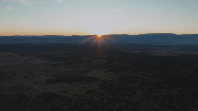 Sunset Over Mountains And Landscape In Arizona, USA. aerial shot