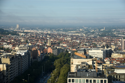 The City of Brussels is the capital of Belgium and also the administrative centre of the European Union. The image shows the City with a residential district and some office buildings, captured during summer season.
