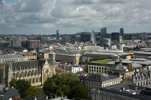 The City of Brussels is the capital of Belgium and also the administrative centre of the European Union. The image shows the City with a residential district and some office buildings, captured during summer season.