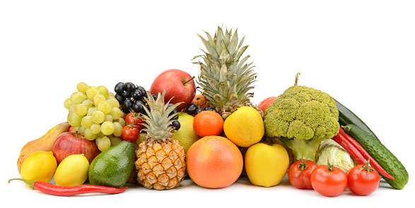 Composition of fresh and healthy vegetables and fruits isolated on white background.