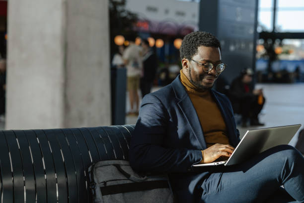 istock African American businessman using smart phone 2115480361