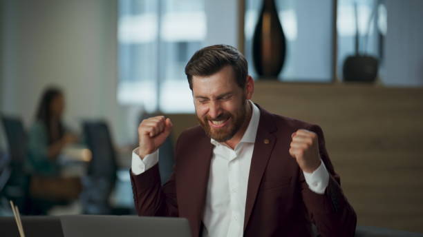 istock Euphoric businessman emotionally gesturing coworking space closeup. Boss waving 2115521647