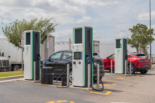 Davenport, Fl, USA, 3-26-24. Electrify America direct charging stations with multiple connectors