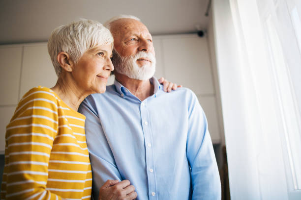 istock Senior couple enyojing time together at the kitchen 2115530093