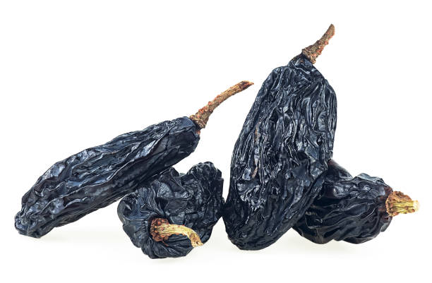 istock Blue sweet raisins isolated on a white background, macro. Dried grape. 2115534960