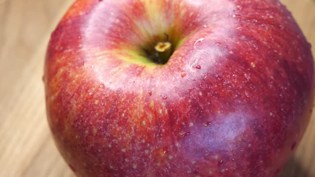 Beautiful red apple close-up. Apple fruit variety gala, rotation.