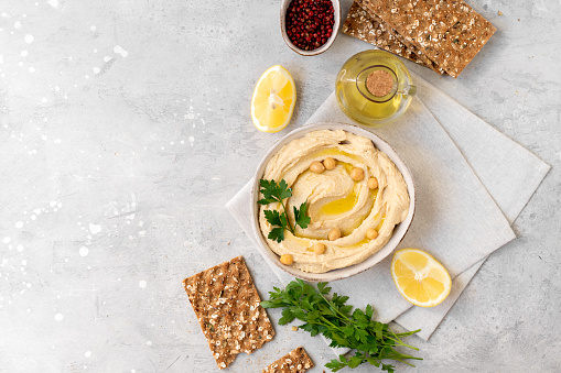 healthy snack fresh hummus multigrain crackers