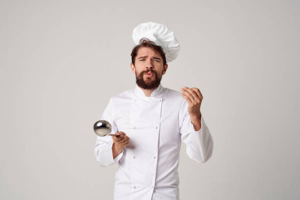 istock chef tasting food restaurant Professional 2115615998