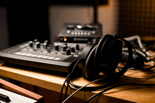 istock Selective focus on headphones in a modern recording studio 2115639186