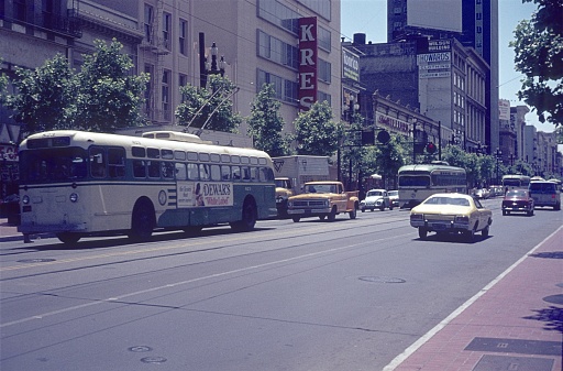 San Francisco, California, USA, 1975. Street scene on the famous Market Street in San Francisco. Furthermore: buildings and traffic.