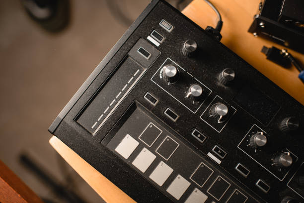 istock Top view close-up of part of chord synthesizer with different knobs and keys 2115643395
