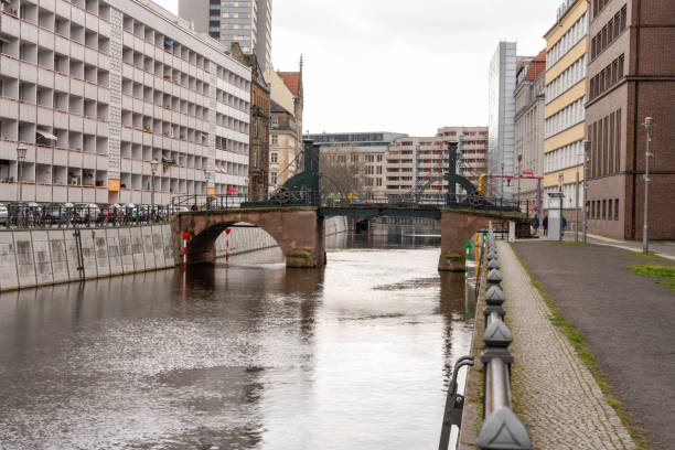 An ancient drawbridge across the river in Berlin. Close-up of the old drawbridge.