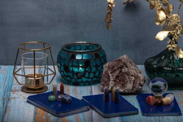 istock An intimate tarot reading session arrangement featuring vibrant crystals, tarot cards, and a geode on a rustic wooden table. 2115671922