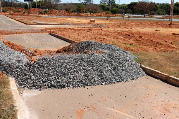istock Ground being broken up to lay sewer pipes 2115683175