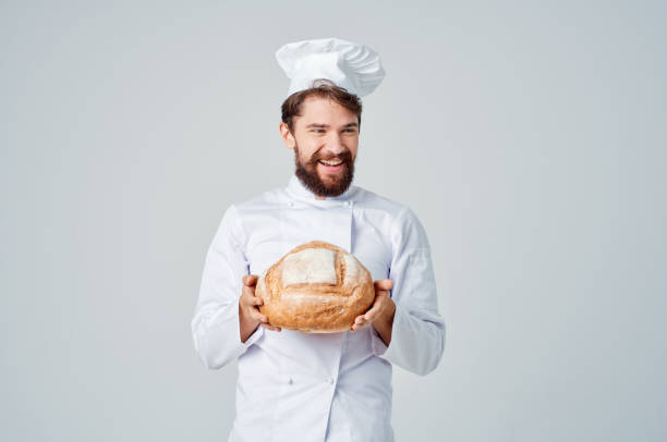 istock Baker kitchen Job bakery products isolated background 2115748573