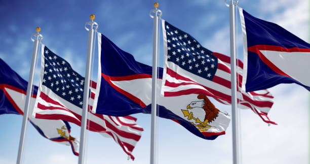 istock The American Samoa flag waving in the wind on a clear day 2115761861