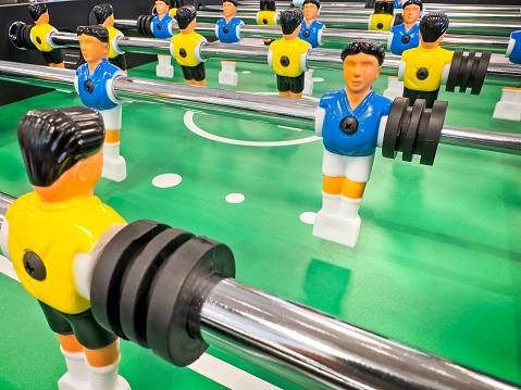 Soccer table foosball with colorful players