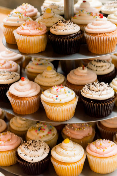 istock A tiered stack of cupcakes in an assortment of flavors 2115820761