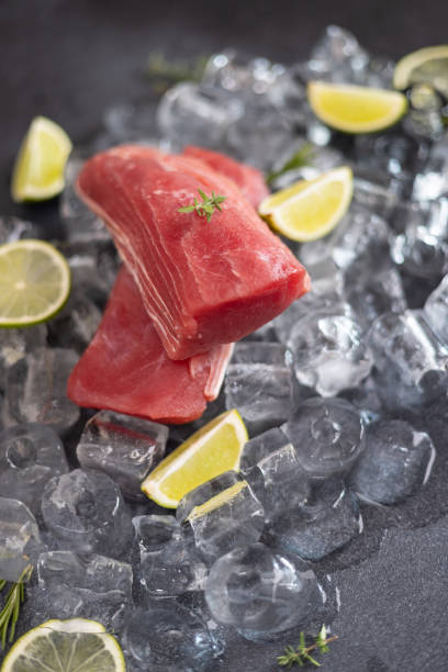 istock Fresh cooled tuna Fish steak lays on ice 2115846364