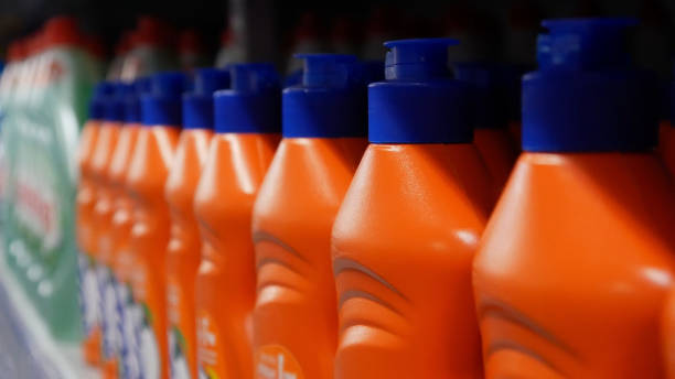 istock A row of dishwashing detergent bottles close-up 2115938971
