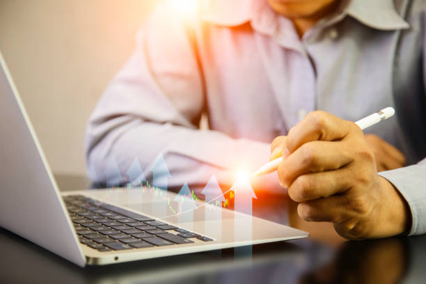 istock Fund, Save money. Save stacking coin money for growing your business investment concept.stack of trading chart in financial concepts and financial investment business stock growth. 2115949101