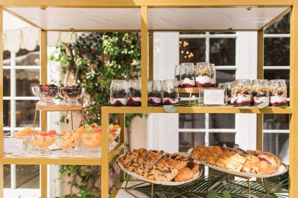 fruit & brunch horderves on display at a spring garden party in palm beach, florida in march of 2024 - spring decoration orange series foto e immagini stock