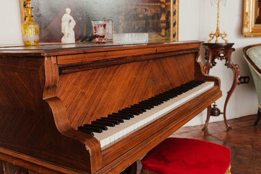 Grand vintage piano in the old house