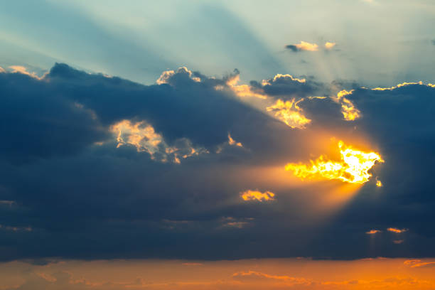 brightly colorful clouds in the evening sky. Lush colored clouds in the sky before sunset