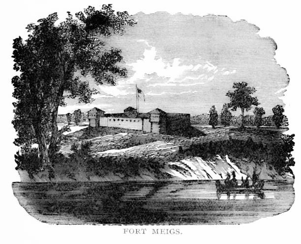 Native Americans canoe past Fort Meigs is on the Maumee River in Perrysburg, Ohio, during the War of 1812. Illustration published 1895.  Copyright expired; artwork is in Public Domain.