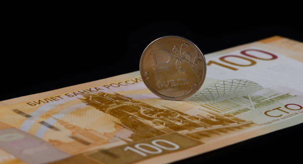istock Conceptual story about Russian currency with a 100 Russian ruble bill 2116089993