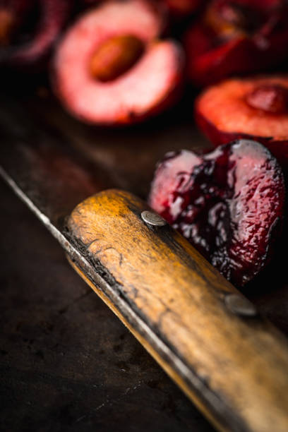 Freshly harvested ripe cherries on the dark rustic background
