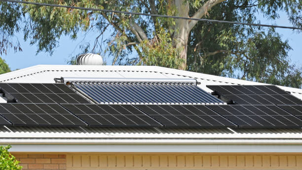 istock Solar panels on a house roof 2116214870