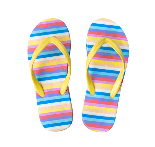 Colorful striped flip flops isolated on white background.
