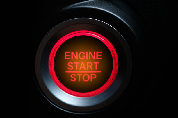 Press the button to start the electric car engine. Transportation and technology concepts