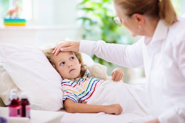 istock Sick little boy with asthma medicine. Ill child. 2116344832