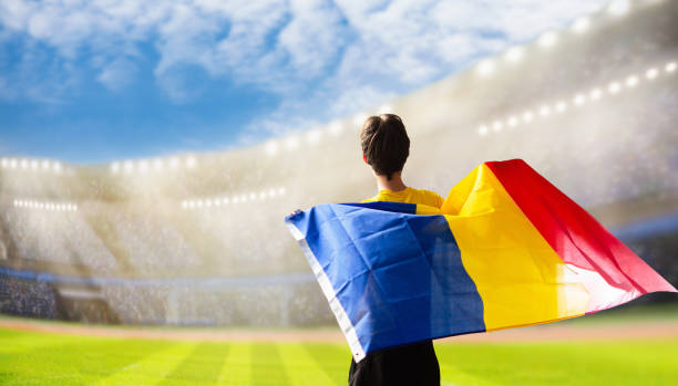 istock Romania football team supporter on stadium. 2116355115