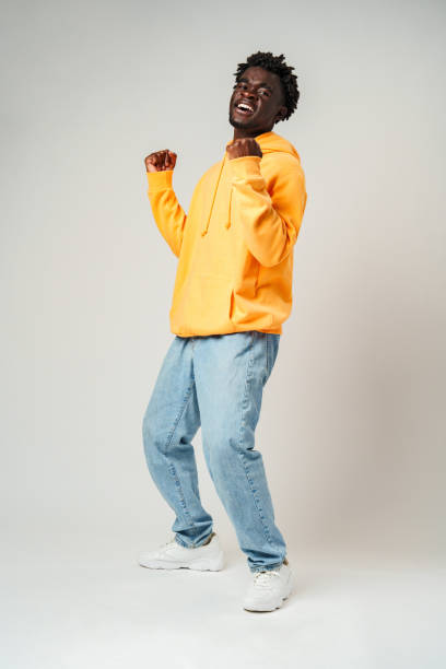 istock Happy Young African Man Gesturung Joy and Success 2116435678