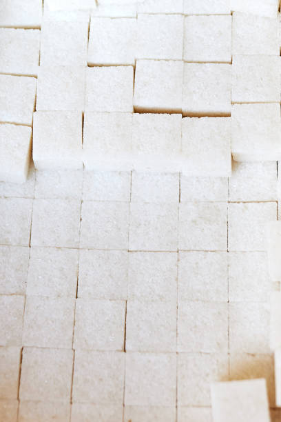Sugar cubes pattern on pink background