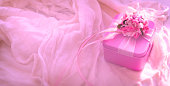 Pink gift box with flowers. Celebration holidays. Valentines Day, Birthday, Dating, Mothers Day