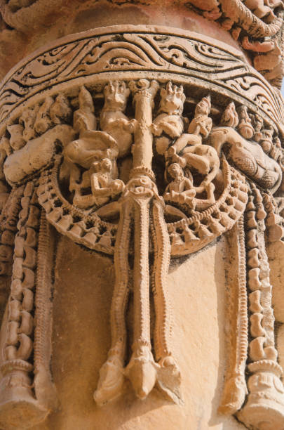 istock Decorated Stone carved pillars at Ghantai temple 2116467717
