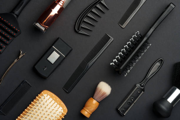 istock Variety of Hair Styling Tools and Accessories Displayed on a Dark Background 2116468770