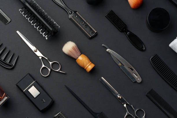 istock Variety of Hair Styling Tools and Accessories Displayed on a Dark Background 2116470890