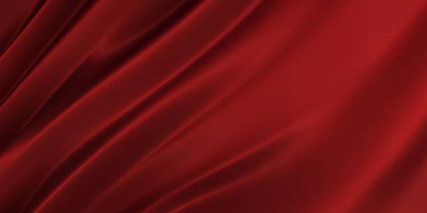 istock Red satin or silk fabric. Flowing cloth 2116480248