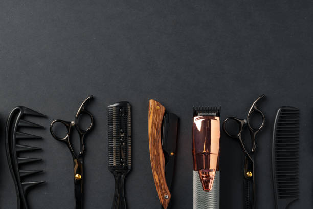istock An Assortment of Professional Hairdressing Tools Laid Out on a Dark Surface 2116482337