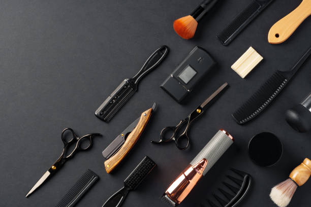 istock An Assortment of Professional Hairdressing Tools Laid Out on a Dark Surface 2116491069