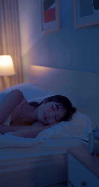 istock asian woman night sleep deeply 2116502517